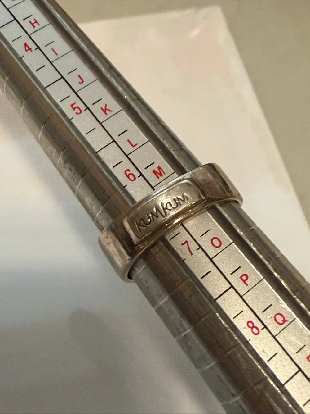 Vintage Sterling silver KumKum ring with blue topaz